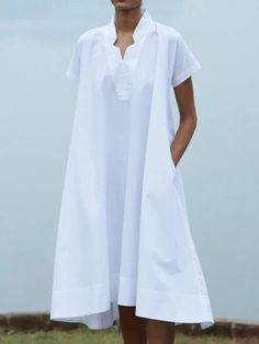 SPU:E5MDR6B99B1Pattern Type:SolidSleeve Type:Short SleeveSilhouette:ShiftWaistlines:NaturalThickness:LightweightMaterial:PolyesterNeckline:V neck,Stand CollarOccasion:DailyStyle:CasualTheme:SummerColor:WhiteSize:S,M,L,XL,XXL,3XLShoulder (cm):S:41, M:42, L:43, XL:44, XXL:45, 3XL:46Length (cm):S:123, M:124, L:125, XL:126, XXL:127, 3XL:128Bust (cm):S:115, M:120, L:125, XL:130, XXL:135, 3XL:140Size ChartSizeUSUKEURShoulderLengthBustcminchcminchcminchS610364116.112348.411545.3M812384216.512448.812047.2L1014404316.912549.212549.2XL1216424417.312649.613051.2XXL1418444517.71275013553.13XL1620464618.112850.414055.1 Solid Color Shift Midi Dress For Vacation, Casual Solid Color Dress With Split Neck, Casual Non-stretch White Midi Dress, White Non-stretch Casual Midi Dress, Solid Shift Midi Dress For Vacation, Solid Split Neck Spring Dresses, Solid Color Split Neck Summer Dresses, White Split Neck Casual Dress, Spring Solid Color Split Neck Dress