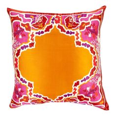 an orange and pink pillow on a white background