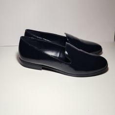 Patent Bandolino Loafer In Navy Blue. Rubber Soles Very Comfortable. Says Size 8 But Runs Small Fits More Like A Size 7. Never Worn Just Tried On. Blue Slip-on Loafers For Formal Occasions, Blue Almond Toe Slip-on Loafers, Navy Slip-on Formal Loafers, Blue Slip-on Loafers, Blue Slip-on Flat Loafers, Loafer Women, Loafers For Women, Loafer Flats, Flat Shoes Women