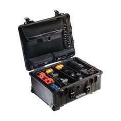 an open black case filled with cameras and other equipment