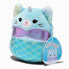 a blue backpack with a cat in it