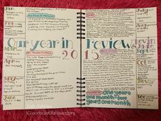 an open notebook with the year in review written on it