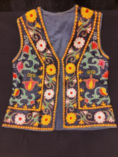 Vintage Uzbekistan Embroidered Vest. All embroidered with Silk and linking cotton. Size; Height 60cm / Armpit 49cm / Skirt 53 cm and Shoulder left to right from top 39cm. Multicolor Embroidered Folk Fabric, Traditional Embroidered Fabric With Motif, Traditional Embroidered Fabric For Spring, Folk Style Multicolor Geometric Embroidered Fabric, Folk Style Floral Embroidered Fabric For Festivals, Multicolor Folk Style Embroidered Fabric, Surface Pattern Design Inspiration, Vintage Fireplace, Embroidered Vest