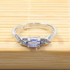 Natural Tanzanite Gemstone Ring for Women 925 Silver Engagement Jewelry Brand Name: Genuine-GemstoneMetals Type: silverMetal Stamp: 925,SterlingGender: WomenMain Stone: TanzaniteCertificateType: GICSetting Type: Prong SettingShape\pattern: OvalStyle: TRENDYRings Type: Wedding BandsOccasion: EngagementGem Stone: Natural TanzaniteGemstone size: 3 mm * 6 mmStyle: Romantic