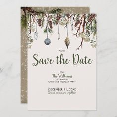 save the date card with christmas ornaments hanging from it's branches and pine cones