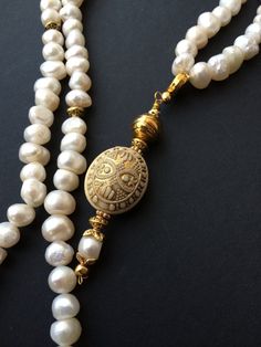 Freshwater pearl Tasbih (prayer beads) on Etsy, $65.00 Elegant Handmade Gold Mala, Hand-strung Pearl Necklace For Wedding, Spiritual Pearl Drop Necklace, Wedding Pearl Necklace Hand-strung, Elegant Pearl Beaded Rosary, Elegant Handmade Cream Beads, Elegant White Pearl Rosary, Handmade Traditional Pearl Necklace, Hand-strung Pearl Necklaces For Weddings