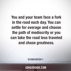 a white wall with the words you and your team face a fork in the road each day