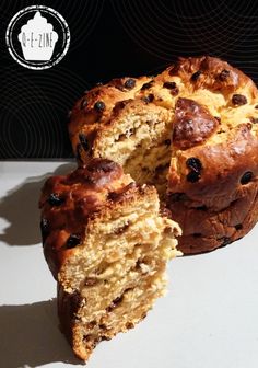 a close up of a cake on a plate with a piece cut out and ready to be eaten