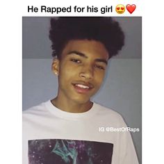 a young man wearing a white shirt with the words he rapped for his girl on it