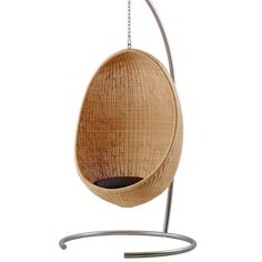 a hanging egg chair on a metal stand