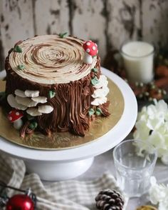 a decorated cake sitting on top of a white plate