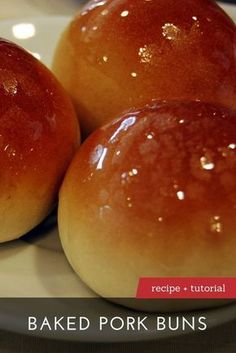 three baked pork buns on a plate with the words recipe and video below it