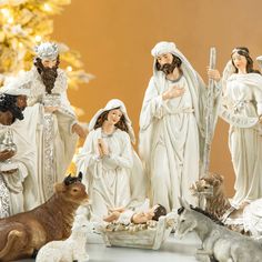 a group of figurines depicting the birth of jesus