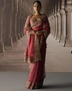 Shop this Red Sari With Jaal Blouse by A&R by Rhea Kapoor at KYNAH. Expertly crafted with traditional techniques, this red organza saree boasts an ornate hand embroidered border of aari, dabka, sequin, and taar work. The luxurious dupion silk blouse showcases a hand-embroidered jaal design. Elevate any occasion with this stunning ensemble. Red Organza Saree, Black Organza Saree, Red Sari, Saree Jackets, Rhea Kapoor, Organza Lehenga, Embroidered Border, Red Saree, Dupion Silk