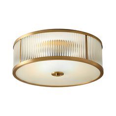 a flush light fixture with pleated glass shades on the bottom and gold trimmings