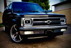 the front end of a black pickup truck