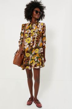 A sophisticated update to the closet staple shirt dress we loveThe Fall Florals Crepe Callahan Shirt Dress perfectly merges classic and trendy with its button front half placket and flirty flutter hemline that encapsulates unfussy femininity. We are pairing this elegant piece with flats or boots for a casual look and switching to heels when the occasion calls for it.Our Favorite Details: Button cuffs Side seam pockets Swingy, relaxed fit Crepe fabric Material: 100% PolyesterCare: Machine wash co Chic Dress With Button Cuffs For Brunch, Fall Shirt Dress With Ruffles, Fall Dresses With Buttons And Spread Collar, Spring Mini Shirt Dress With Ruffle Hem, Spring Mini Length Shirt Dress With Ruffle Hem, Spring Mini Dress With Placket, Button-up Ruffle Hem Dress For Daywear, Spring Shirt Dress With Button Cuffs For Dress Down, Ruffle Hem Button-up Dress For Daywear