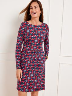 We’re famous for this easy-care, easy-wear, jersey fabric! Beautiful dresses in every silhouette. Body slimming. Simple to slip into. Perfectly packable–just right for work and travel. Features Fit & Flare Dress Jewel Neck Long Sleeve Pull on closure Hits Above Knee Imported Fit: Misses: 36 1/4"; Petite: 34 3/4"; Plus: 40"; Plus Petite: 37 3/4" Material: 93% Nylon, 7% Spandex Care: Machine Wash Cold; Turn Garment Inside Out; Only Non-Chlorine Bleach When Needed; Tumble Dry Low; Cool Iron, If Nee Work And Travel, Petite Shorts, India Ink, Classic Style Women, Jewel Neck, New Arrival Dress, Dress Clothes For Women, Ruby Red, Fit Flare Dress