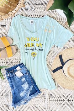 Some days you just need a graphic T-shirt to either show the world how you're feeling or to help possibly redirect your state of mind.🙂 | Graphic T-Shirt | Sunshine | You Are My Sunshine | Boyfriend Fit | Boyfriend Tee | Women's Tops | Casual Tops | Summer Fashion | Spring Fashion | Trends | Style | Shopping | Cute Shirts | Cheap Tops | Cute Shirts for Women | Casual Style | Online Boutique | Plus Size Fashion | Tee | Graphic Tees | T-Shirts | Tops for Leggings Sunshine Boyfriend, Boyfriend Top, Tie Waist Dress, One Clothing, My Sunshine, Boyfriend Tee, You Are My Sunshine, Sleeveless Tshirt, State Of Mind