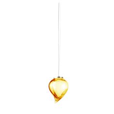 a yellow glass light hanging from a cord