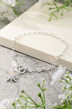 Inspired by the beauty of the night sky, our Sterling Silver Northern Star Bracelet captures the elegance of a guiding star. Perfect for those who seek a stylish reminder of direction and purpose, this bracelet adds a touch of celestial charm to any outfit. Star Silver, Silver Chain Bracelet, Star Bracelet, Bracelet Sterling Silver