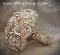 a bridal bouquet with pearls and flowers