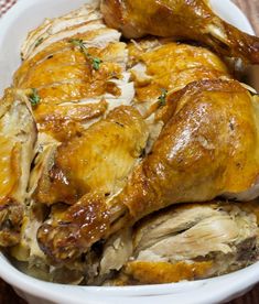 a close up of a chicken in a bowl on a table with the words perfect make ahead turkey