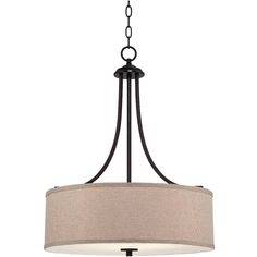 a chandelier with a light fixture hanging from it's center and beige fabric shade