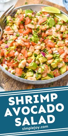 shrimp avocado salad in a skillet on a cutting board with the words shrimp avocado salad