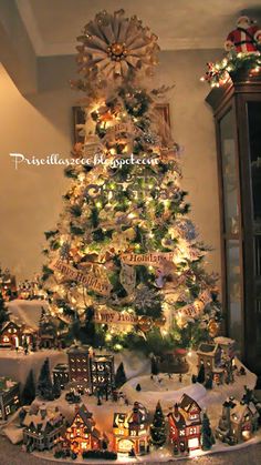 a christmas tree is decorated with lights and ornaments