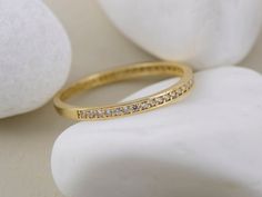 "The handmade 14k Solid Gold CZ Zirconia Half Eternity Ring is a delicate and elegant gift for her.  ABOUT THE JEWELRY This Elegant Ring & Minimal Ring is pretty attractive for those who search for a special present. Genuine Gold and Cubic Zirconia Eternity Ring is a perfect gift for a Birthday, Valentine's Day and Wedding. You can wear this ring all by itself or stack it up with your other favourite rings! The ring is made of 14k or 18k Solid Gold and CZ Zircon stones. Hypoallergenic, lightweig Dainty Wedding Ring With Pave Setting, Elegant Eternity Band With Pave Setting As Gift, Wedding Eternity Band With Pave Setting, Wedding Stackable Rings With Pave Setting Cubic Zirconia, Cubic Zirconia Stackable Rings With Pave Setting For Wedding, Minimalist Stackable Wedding Rings With Pave Setting, Gift Stackable Round Cut Rings With Pave Setting, Elegant Eternity Band, Pave Setting Eternity Band Ring As Gift