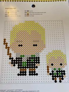 a cross stitch pattern with two people on it