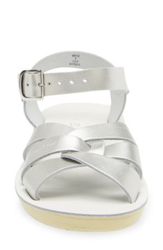 A buckle-embellished strap extends the breezy, beach-ready style of a lightweight and versatile everyday sandal. Adjustable strap with buckle closure Leather upper and lining/synthetic sole Imported Kids' Shoes T-strap Sandals With Adjustable Strap For Beach, Closed Toe Sport Sandals With Adjustable Strap For Beach, Beach Sport Sandals With Buckle Closure And Round Toe, Closed Toe Sandals For Swimming In Summer, Beach Slide Sandals With Adjustable Fit, Beach Sport Sandals With Ankle Strap And Buckle, Adjustable Slide Sandals For Beach, Adjustable Fit Slide Sandals For Beach, Adjustable Sandals With Buckle Closure For Beach