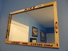 a mirror hanging on the wall above a door