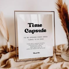 there is a sign that says time capsule on it