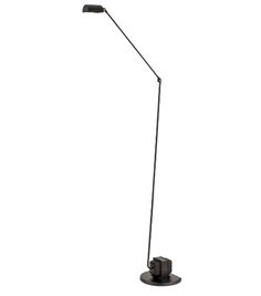 a black floor lamp on a white background with the light turned on and one arm down