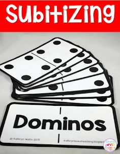 some dominos are stacked on top of each other with the word subtizing