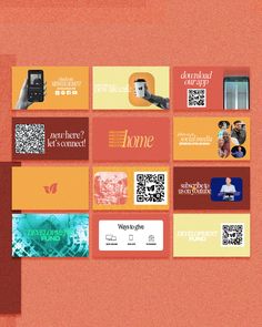 an orange and red wall with some qr code cards on it, as well as a cell phone