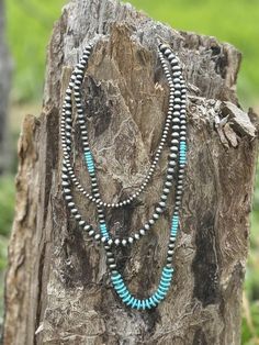 Embrace the timeless beauty of the Southwest with this stunning layered necklace featuring silver pearls and captivating turquoise beads. Each layer cascades gracefully, creating a unique and eye-catching statement piece. (20", 24", 30" long)  Faux silver and turquoise Blue Stacked Round Bead Jewelry, Navajo Pearls, Layer Necklace, Layered Necklace, Silver Pearls, Turquoise Beads, Western Wear, Layered Necklaces, Timeless Beauty