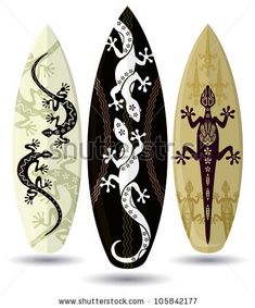 three surfboards with lizards on them