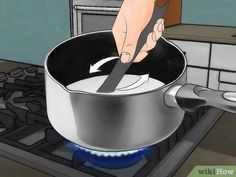 a person is stirring something in a pan on the stove