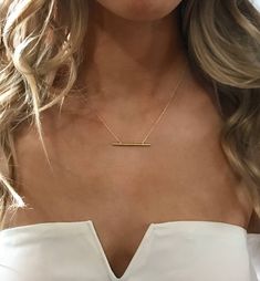 Gold Necklace, Pendant Necklace, Minimal Necklace, 14k Gold Bar Necklace, MATERIALS & MEASUREMENTS: - 14K Gold over brass - Pendant Height 1/8 in | 3mm x Width 1 1/4 in | 3.2 cm - Chain Length 16 1/2 in | 42 cm - Hypoallergenic, lead & nickel free - Handcrafted in NYC To shop more Pendant Necklaces: https://www.etsy.com/shop/AccessoriesAtelier?ref=shop_sugg&section_id=24595051 14k Gold Bar Necklace, Dainty Necklace Gold, Gold Necklace Pendant, Necklace Bar, Bar Pendant Necklace, Minimal Necklace, Friend Bracelets, Gold Bar Necklace, Dainty Gold Necklace