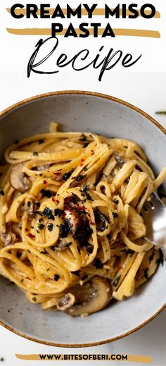 a white bowl filled with pasta and mushrooms