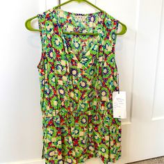 Blouse Style Fabric Tank Top By Cabi. New With Tags. Size S. Longer Style Fit With Elastic Around The Waist To Frame The Waist. Colors Are Lime Green, Red, Teal, Purple And Beige. Green V-neck Top With Vibrant Print, Multicolor V-neck Rayon Blouse, Green Vibrant Print Summer Blouse, Summer Green Blouse With Vibrant Print, Summer Blouse With Vibrant Green Print, Multicolor Sleeveless Casual Blouse, Multicolor Sleeveless Top For Spring, Casual Sleeveless Multicolor Print Tops, Casual Sleeveless Multicolor Blouse