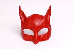 Description: Masks made by hand with an artisanal method, so when you buy one, you will have a unique piece! Undoubtedly, you will be the target of all eyes that will wonder: who is the real person underneath? This mask will adapt perfectly to your face, flattering all features. We are sure that it will be your favorite mask. You will also look elegant and feel super comfortable. Originally, Catwoman was a jewel thief, skilled in disguise, and was known simply as The Cat. As the years went by, s Batgirl Mask, Catwoman Mask, Mask Cat, Red Mask, Registry Items, Leather Mask, Cat Mask, In Disguise, Costume Mask