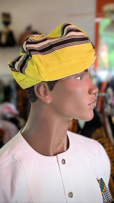 Discover the Elegance of African Heritage: Adebayo Aso Oke Fila Kufi Hat by Dupsie's African Fashion** Introducing the Adebayo Aso Oke Fila Kufi Hat, a masterpiece of African fashion, intricately handwoven with the finest threads in vibrant yellow and striking black stripes, exclusively by Dupsie's African Fashion. This African hat, a symbol of sophistication and cultural pride, seamlessly blends traditional Yoruba craftsmanship with contemporary style, making it a must-have accessory for both f Kufi Cap, African Dashiki Shirt, African Hat, African Tops For Women, African Pants, Kufi Hat, African Shoes, Yoruba People, African Hats