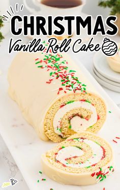 a roll is cut in half and sitting on a plate with sprinkles