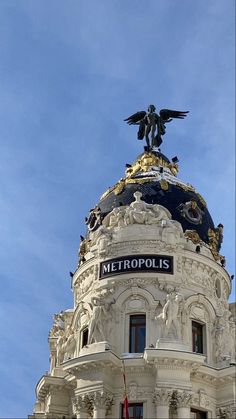 the top of a building with an eagle on it