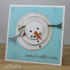 a baby it's cold outside card with a snowman made out of paper