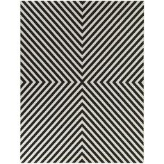 a black and white rug with diagonal stripes